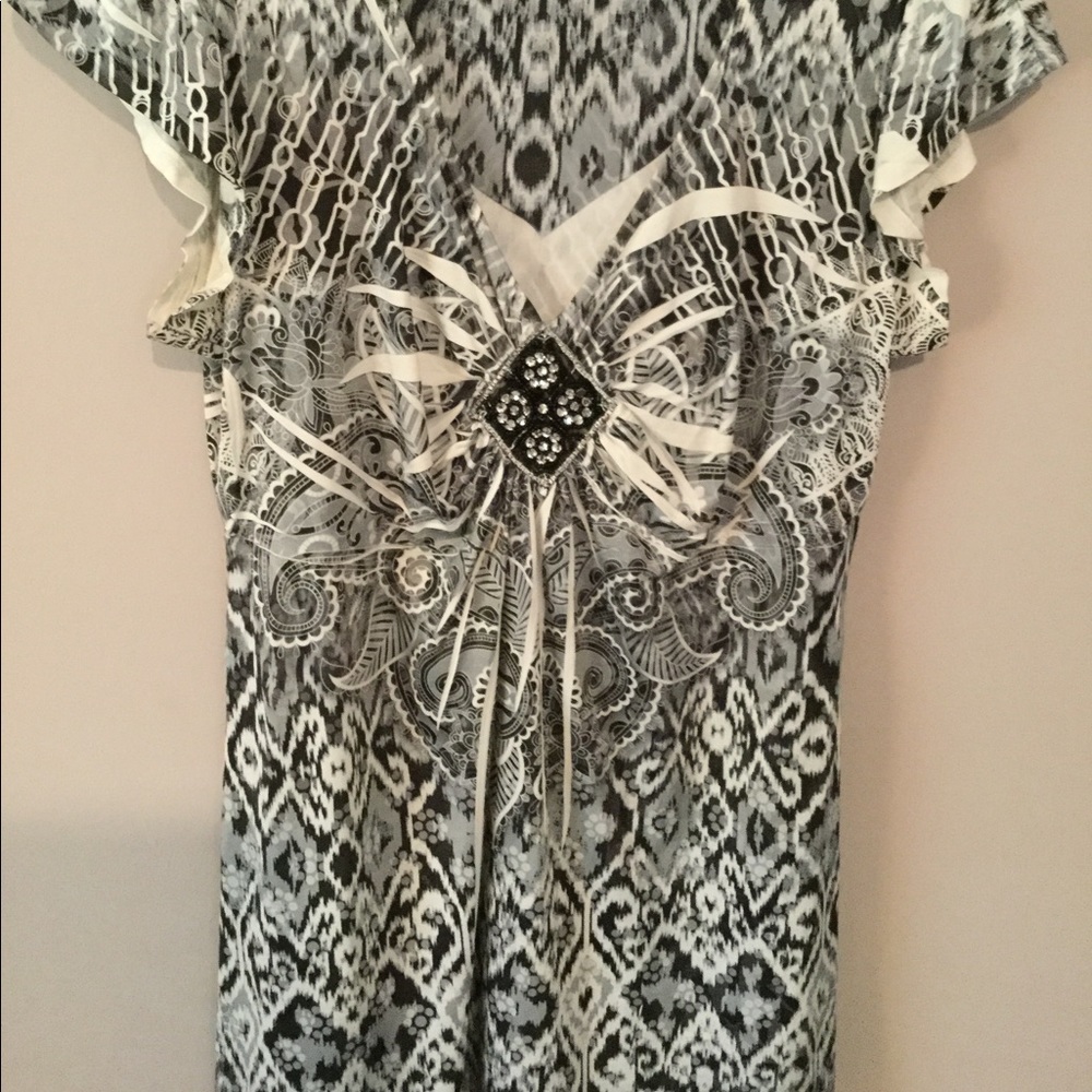 Flattering blouse with bead embellishments